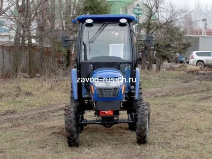 Трактор Четрпиллер XT-404 с кабиной